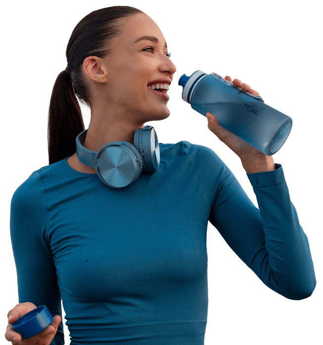 healthy woman drinking water refreshed